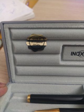 conjunto de pluma, bolígrafo y portaminas.