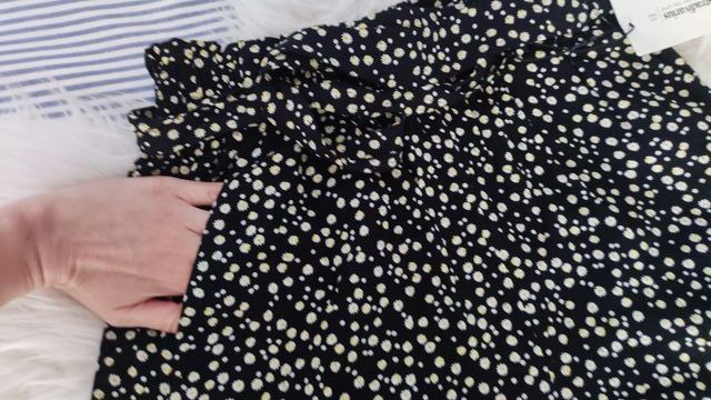 Shorts fluidos de margaritas