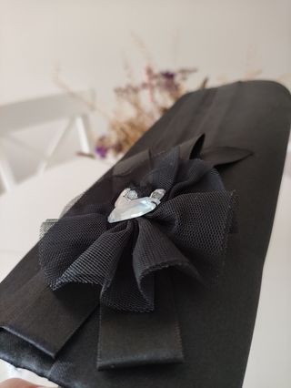 Bolso de mano tipo clutch negro