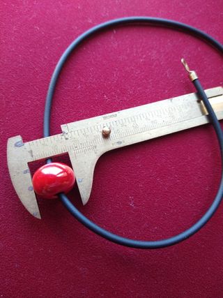 Gargantilla diselo.(oro,caucho ,porcelana)