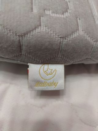 cuña anticolicos bebe