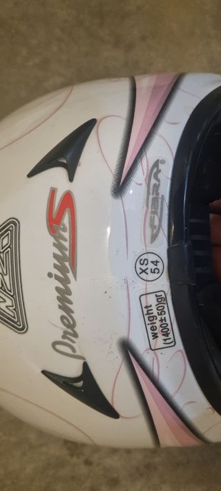 Casco moto mujer NZi talla XS rosa y blanco.