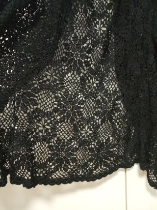 Preciosa rebeca de hilo negro Tintoretto