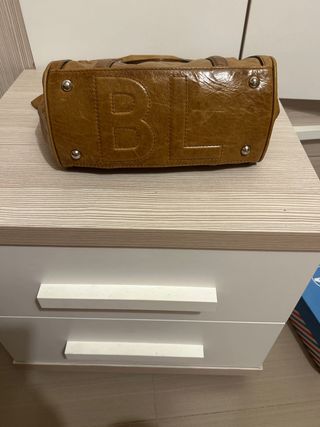 Bolso de mano en cuero Bimba y Lola