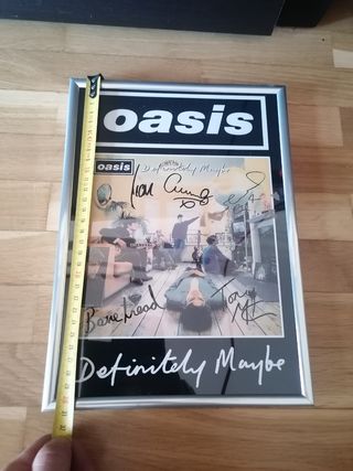reproducción cartel Oasis firmado