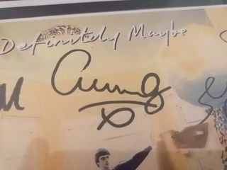 reproducción cartel Oasis firmado