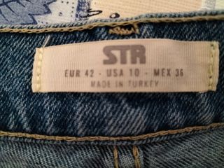 Short denim cintura asimétrica