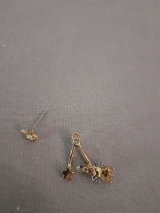 Pendiente cohete y estrella Zara