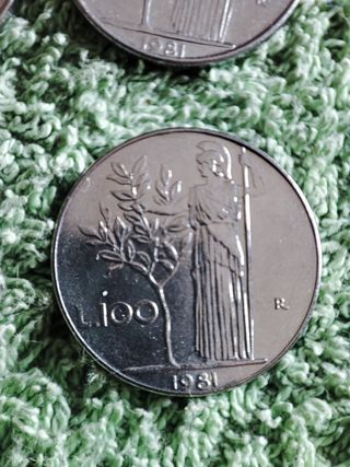 100 lire Italia 4 monete