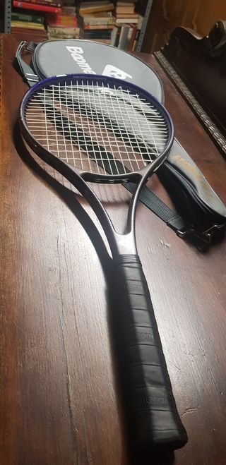 Tres Raqueta de tenis .