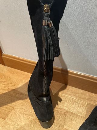 botas altas ante negro