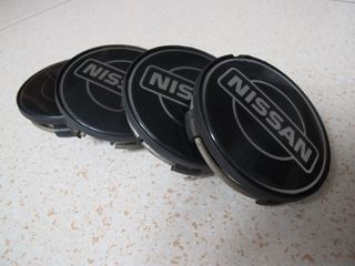 JUEGO DE 4 TAPAS DE LLANTAS NISSAN