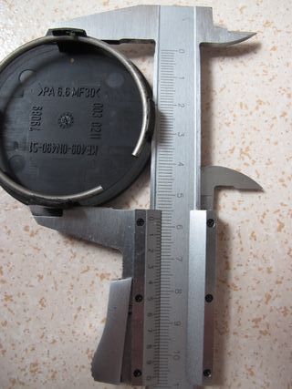 JUEGO DE 4 TAPAS DE LLANTAS NISSAN