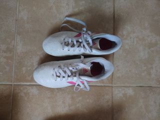 Botas de tacos de futbol