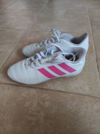 Botas de tacos de futbol