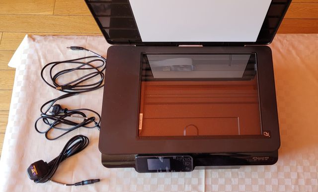 Impresora escáner HP con cartucho y accesorios