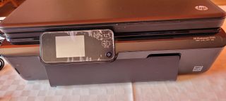 Impresora escáner HP con cartucho y accesorios