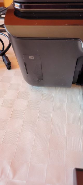 Impresora escáner HP con cartucho y accesorios