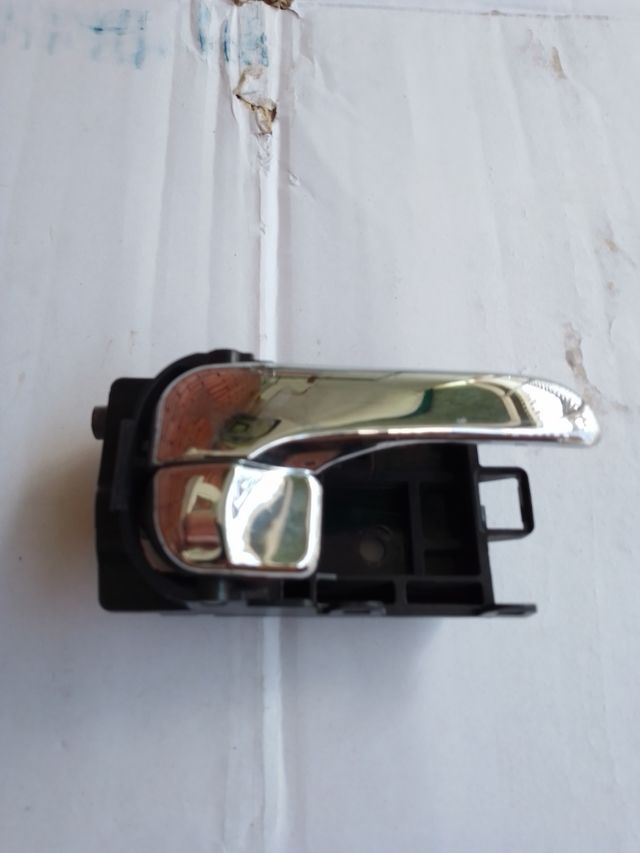 Tirador apertura puerta