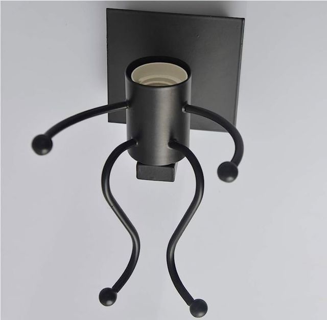 lampara muñeco forja