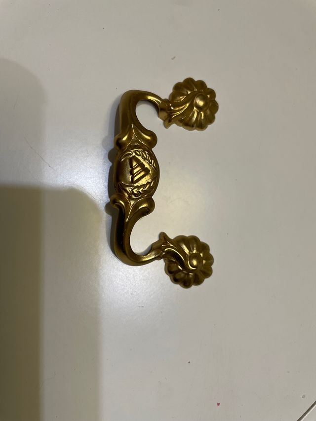 Tiradores oro envejecido