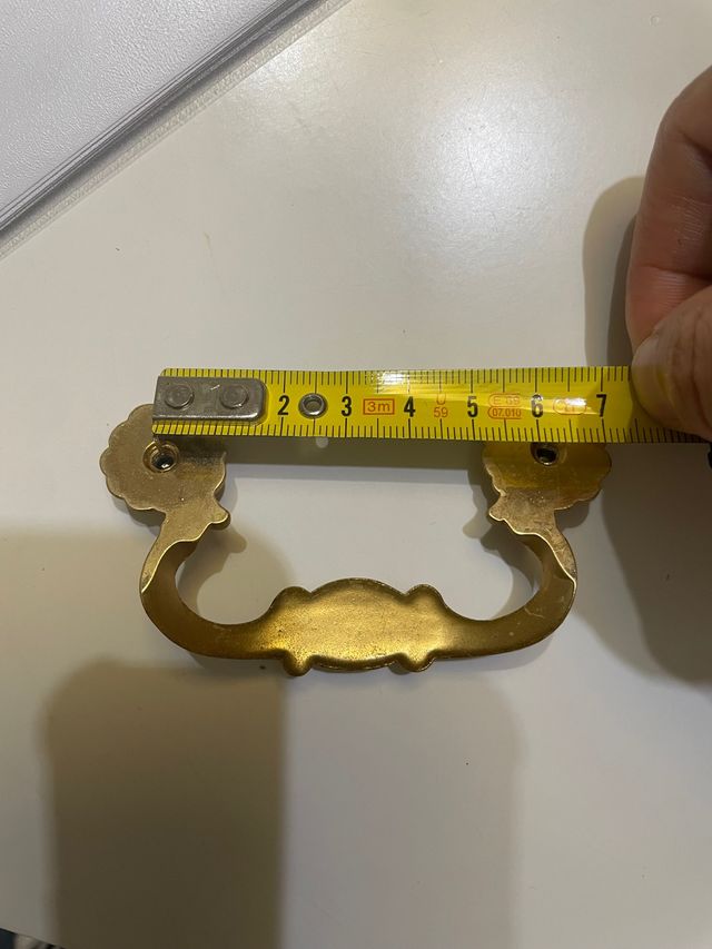 Tiradores oro envejecido