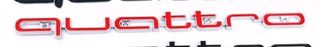 Insignia rejilla delantera Audi con logo Quattro.