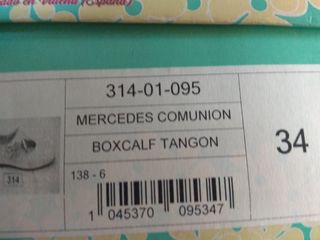 traje de comunión impecable
