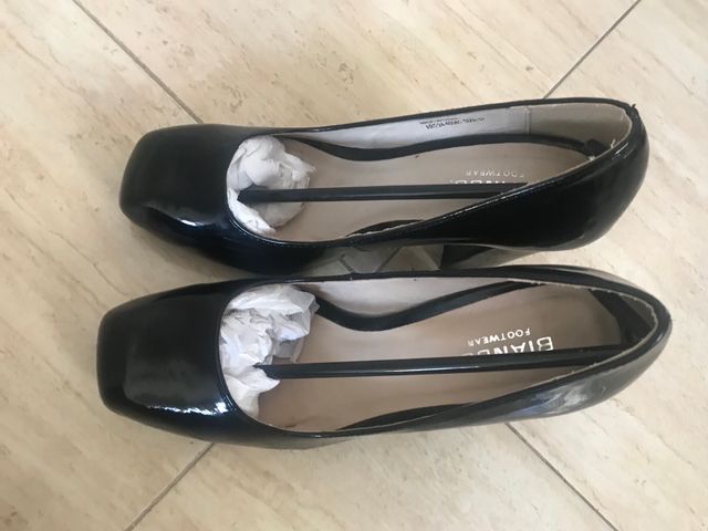 zapatos negros tacón fiesta Italia