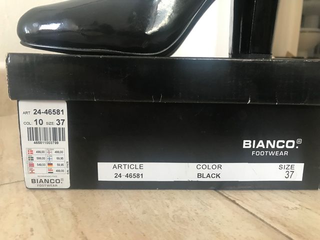 zapatos negros tacón fiesta Italia