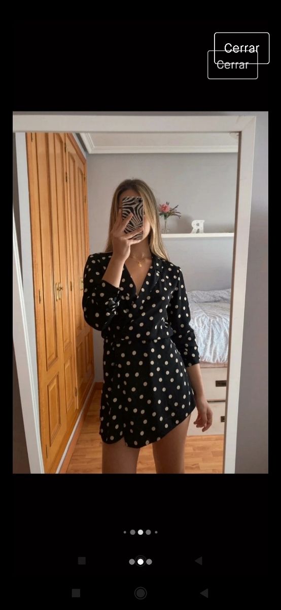 Mono negro con topos beiges