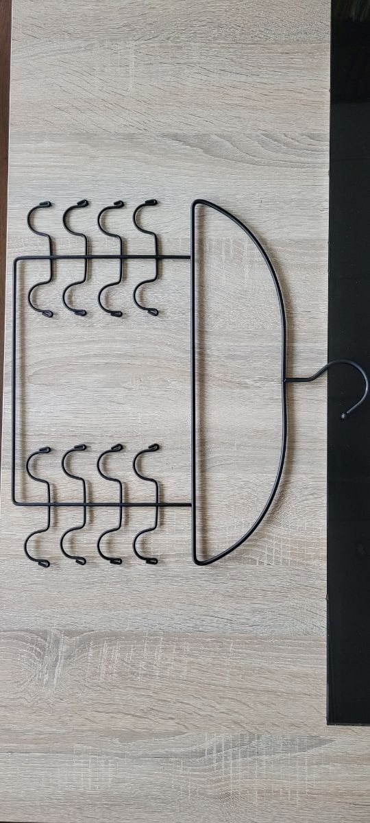 Appendino in metallo, portato dagli Stati Uniti. Inutilizzato.