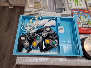 Consola Wii con muchos juegos y accesorios
