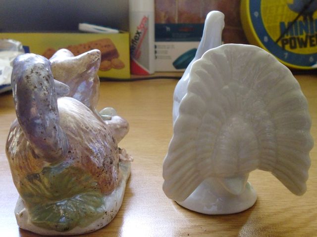Figuras de cerámica una paloma y un gatito