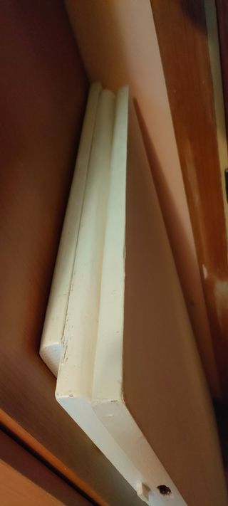 Mesa de madera ampliable.