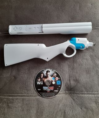 Juego wii-U:Smack Down VS Raw 2010+Escopeta"NUEVA"