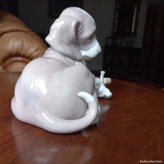 Figura de Lladró. Cachorro y caracol