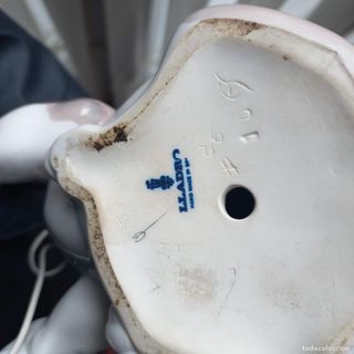 Figura de Lladró. Cachorro y caracol