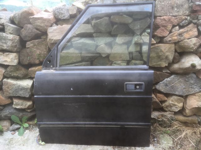 Puerta izquierda discovery 300 tdi