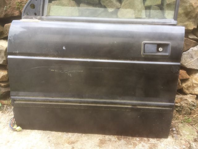 Puerta izquierda discovery 300 tdi