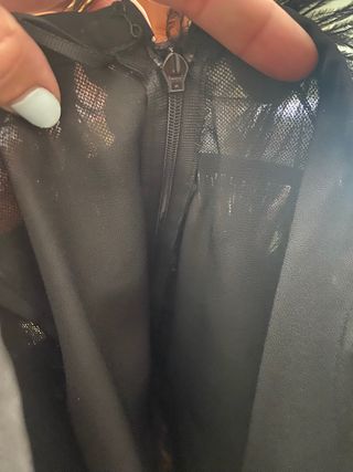 Minifalda negra plumas