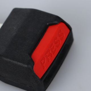 Clip para cinturón de seguridad