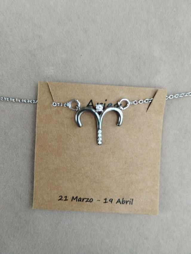Colgantes horoscopo plata ley