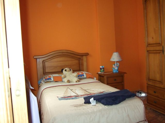 Edredón habitación y estor de ventana