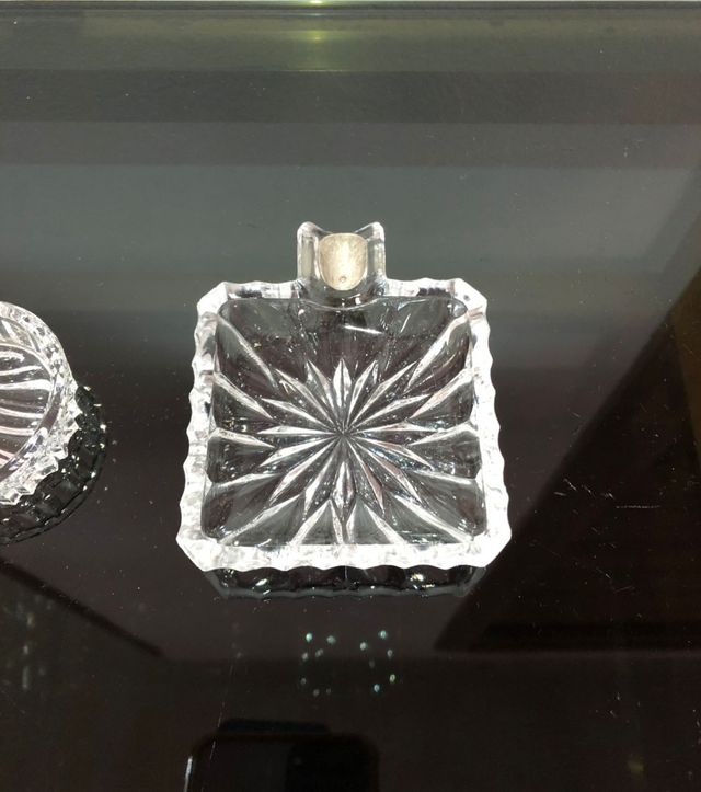 Set di posacenere in vetro e argento