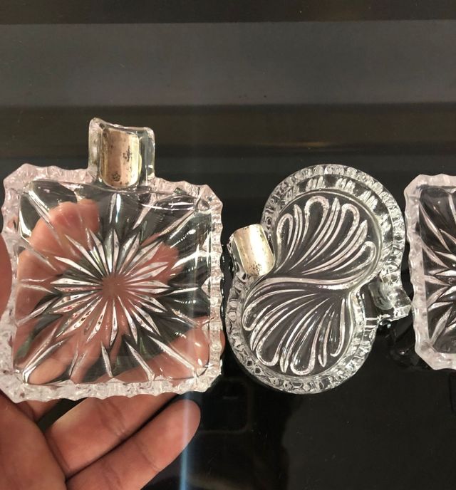 Set di posacenere in vetro e argento