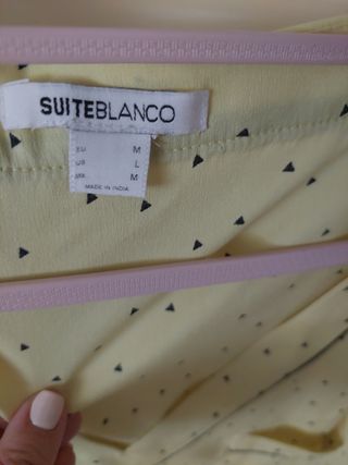 Blusa amarilla de tienda Blanco