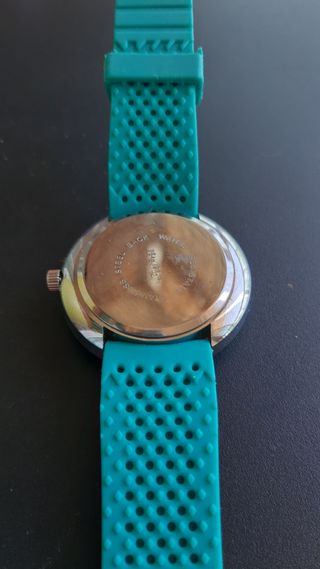 Reloj turquesa plástico