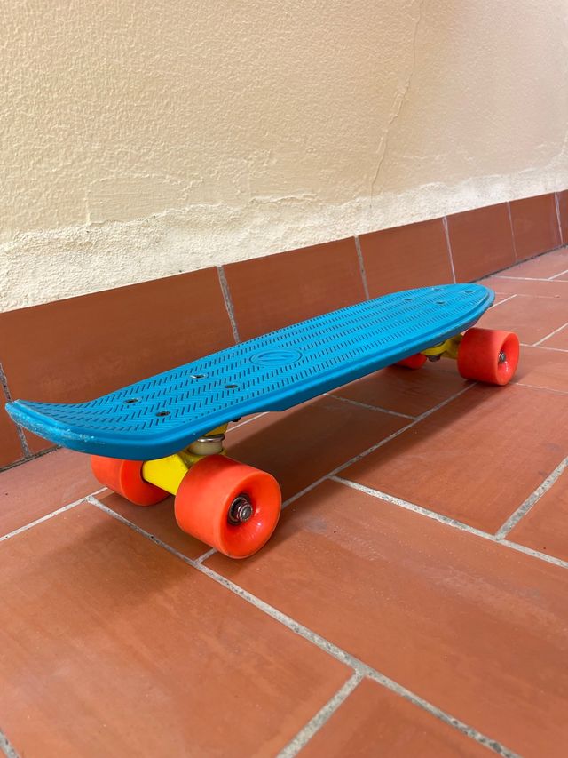 Monopatín skate turquesa