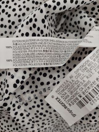 Falda larga blanca con topos negros